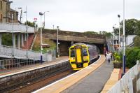 The 1019 to Glasgow Central arrives at Shotts on an overcast day in August 2016. Despite the absence in this view of any obvious signs of the pre-electrification work, preparations are well in hand. Behind the camera at the end of platform one there is now a sizeable contractor's compound with an access point for the bridge replacement work.<br><br>[Colin McDonald 31/08/2016]