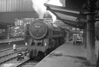 Britannia Pacific no 70035 <I>Rudyard Kipling</I> waits with a northbound train at Carlisle platform 3 in the early 1960s.<br><br>[K A Gray //]