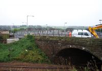 View south at Station Road overbridge in Shotts. The temporary bridge which will carry pedestrians and diverted utility services across the railway is being assembled on the closed roadway. The foundations for the south side of the temporary bridge can be seen on the left.<br><br>[Colin McDonald 14/09/2016]
