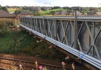 The temporary footbridge at Shotts station in place and bolted to its foundations on 18 September 2016. The plastic pipes incorporated in the structure will act as trunking to facilitate the diversion of services while the new bridge is built. <br><br>[Colin McDonald 18/09/2016]