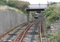 The gauge of the Aberystwyth Cliff Railway appears to be variable and there are some noticeably uneven rail joints. The line also performs something of a <I>switchback</I> too rather than a steady climb. This is the view towards the upper station on Constitution Hill from an ascending car approaching the slight divergence at the passing point on 18th September 2016.<br><br>[Mark Bartlett 18/09/2016]