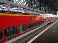 A Regio DB double decked train in striking bright red at Frankfurt.<br><br>[Veronica Clibbery 25/09/2016]