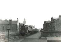 Standard 2-6-4 tank 80127 runs north through the remains of Gorbals station (closed 1928) with a Neilston Low - St Enoch train in the summer of 1961.  <br><br>[G H Robin collection by courtesy of the Mitchell Library, Glasgow 20/07/1961]