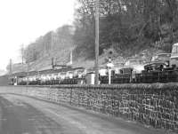 A 'Peak' takes a lengthy car train north through Galashiels in May 1963.<br><br>[Dougie Squance (Courtesy Bruce McCartney) /05/1963]