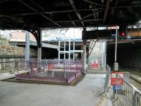 Ongoing work at the east end of Dundee station on 19/10/2016. The pit will be for an escalator, I expect, coming down from the currently skeletal booking hall.<br><br>[David Panton 19/10/2016]
