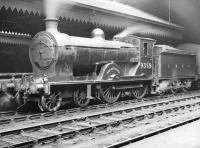 Reid D29 'Scott' class 4-4-0 no 9359 <I>Dirk Hatteraick</I> with a train at Waverley in the 1930s. Built at Cowlairs in 1911, the locomotive was renumbered 62412 in 1948 and survived in service for a further two years until withdrawal from Dundee Tay Bridge in September 1950.  <br><br>[Dougie Squance (Courtesy Bruce McCartney) //]