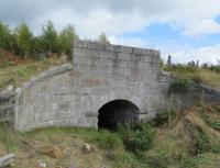 After nearly four decades hidden behind trees and vegetation, the granite brickwork of this bridge looks in remarkably good condition bearing in mind the harsh Highland winters of past.<br><br>[Clive Meredith 04/09/2016]