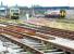 The south end of Dumfries on a Saturday afternoon in September 2003 looking back towards Annan Road bridge. A DMU heading for Carlisle is passing First Engineering DR 7380 4 <I>James Watt</I> stabled in the sidings.<br><br>[John Furnevel 13/09/2003]