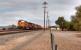 Five diesel locomotives working in multiple haul a seventy nine wagon train of double deck containers through Seligman, formerly a junction on the Santa Fe Railroad in Arizona. Photo by Mark Edwards 30th July 2016<br><br>[Mark Bartlett Collection 30/07/2016]