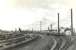 View over Ardrossan North station in August 1960, looking towards the harbour. The station had closed to passengers in 1932. [See image 51717]<br><br>[G H Robin collection by courtesy of the Mitchell Library, Glasgow 24/08/1960]