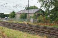 On the west side of the WCML just south of the site of Bay Horse station is a building with large sliding doors on either end. It certainly looks like it was used by the railway as a goods shed but I don't have any definite proof, just the old maps which show there were sidings in that area. <br><br>[John McIntyre 20/08/2016]