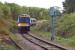 This rural branch line scene is misleading, for it is actually the north curve of the Cowlairs triangular junction in Glasgow. During the temporary closure of Glasgow Queen Street High Level in 2016, this curve was brought into use for services between Queen Street Low Level and Stirling/Alloa/Dunblane. The train is the 16.52 Low Level to Alloa service on 16th May that year. It is awaiting passage of the 17.01 Low Level to Edinburgh (via Springburn) service in order to proceed on to the main line.<br><br>[Mark Dufton 16/05/2016]