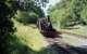 Hunslet 0-4-0ST 'Alan George' arrives back at Henllan on the Teifi Valley Railway on a sunny August day in 1995.<br><br>[John McIntyre /08/1995]