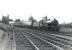 A Kilmarnock - Winton Pier train takes the left fork at Holm Junction after leaving Ardrossan South Beach station on 4 July 1959. The locomotive is one of Hurlford shed's Fowler 2P 4-4-0s no 40688, only 4 weeks from final withdrawal.  <br><br>[G H Robin collection by courtesy of the Mitchell Library, Glasgow 04/07/1959]