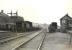 McIntosh 0-4-4T 55185 with a pair of ex-Caledonian corridor coaches at Banff station in the spring of 1954.<br><br>[G H Robin collection by courtesy of the Mitchell Library, Glasgow 17/04/1954]