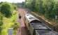 A coal train seen shortly after passing Niddrie West Junction heading for Niddrie South on 16 June 2006. On the left is the trackbed of the former direct route to the ECML via Wanton Walls Junction [see image 29573].<br><br>[John Furnevel 16/06/2006]