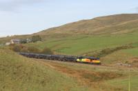 Colas 60096 has just lifted the empty bitumen tanks from Preston Dock over the Copy Pit summit and is now starting the winding descent to Hall Royd Jcn near Todmorden on 31st October 2016.<br><br>[Mark Bartlett 31/10/2016]