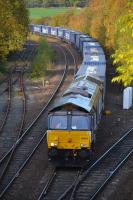 The Inverness - Mossend intermodal, diverted through Fife because of engineering work in the Stirling area, passes Inverkeithing Central Junction, behind DRS 66423, on 30 October.<br><br>[Bill Roberton 30/10/2016]