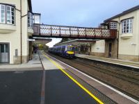 A Glasgow-bound service calls at the immaculate Gleneagles station on 26/10/2016. Gleneagles shows that a station doesn't have to be staffed to look good. Incidentally Gleneagles doesn't exist according to the BBC weather app so as you can see it has no weather.<br><br>[David Panton 26/10/2016]