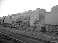 Withdrawn Stanier Pacific 46244 standing in Upperby yard on a grey October day in 1964 devoid of nameplates that once proclaimed its Royal identity as <I>King George VI</I>. The former LMS streamliner was broken up by Arnott Young in Troon during December that year. [See image 48141]<br><br>[K A Gray 17/10/1964]