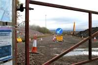 Works entrance to the site of the EGIP electric train depot at Millerhill on 6 November 2016 with construction activity halted for the weekend. View is south from Whitehill Road.  <br><br>[John Furnevel 06/11/2016]