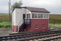 The 1909 signal box at Dalwhinnie in unmodified state in 1990. It has since been rebuilt. This box replaced north and south boxes here. The view of this box is obscured from the northbound platform by the base of the former water tank.<br><br>[Ewan Crawford //1990]