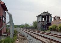 View west from the end of the (then) closed Maryhill station of the burned signal box and its replacement to the left.<br><br>[Ewan Crawford 29/05/1987]