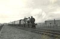 An Ardrossan Town - Kilmarnock train near Saltcoats on 4 April 1959 behind Fowler 2P 4-4-0 40688.  <br><br>[G H Robin collection by courtesy of the Mitchell Library, Glasgow 04/04/1959]
