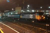 UKRL's 56098 'Lost Boys 68-88' waits at Preston with two barrier coaches in the evening of 07 December 2016 whilst returning to Leicester from a trip to Glasgow Works. The loco was carrying a headboard 'Rail Operations Group'.<br><br>[John McIntyre 07/12/2016]
