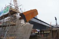 The girders of the bridge over the River Irwell are in place and a small part of the sweeping curved support is in place when viewed on 15 December 2016. <br><br>[John McIntyre 15/12/2016]
