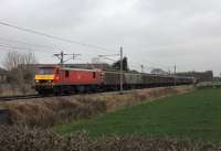 The third and final week of the extra 2016 <I>Christmas Mail</I> services saw the Class 90 hauled <I>Cargowaggons</I> continue to run between Sheildmuir and Warrington mail depots. DBS 90029 approaches Brock with the fifteen wagon train on 21st December. <br><br>[Mark Bartlett 21/12/2016]