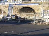 A squinty bridge, and an optical illusion caused by the angled stonework - the arch seemingly leading into the station carpark.  The track actually runs from the left of the picture towards the arch. Photo taken a few days before it was due to be demolished as part of the preparation for electrification. <br><br>[Colin McDonald 04/01/2017]