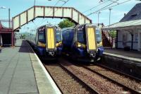 Left for Glasgow, right for Ayr - the ubiquitous 380s.<br><br>[Colin Miller 23/06/2016]
