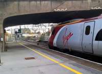 <h4><a href='/locations/C/Coventry'>Coventry</a></h4><p><small><a href='/companies/L/London_and_Birmingham_Railway'>London and Birmingham Railway</a></small></p><p>An up Pendolino seems to be staring wistfully at the former signal box and the non-electrified Leamington line. 62/99</p><p>26/11/2016<br><small><a href='/contributors/Ken_Strachan'>Ken Strachan</a></small></p>