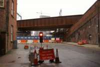Looking south down Water Street, with the L&M Liverpool Road station above to the immediate left, the deck of the new Ordsall Chord bridge and beyond it the replacement bridge on the line from Castlefield Jct to Ordsall Jct.These two bridges were installed during a closure over Christmas and New Year.<br><br>[John McIntyre 10/01/2017]