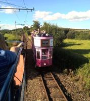 Trams for Colyton (left) and Seaton (right) crossing on the delightfully rural Seaton Tramway in the summer of 2016. [see image 53409]<br><br>[Ken Strachan 26/08/2016]