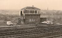 The signal box at the south end of Dalry station in 1984. The town can be seen behind the box, the station was off to the right and Dalry Junction is far off to the left. The box was originally Dalry Station, until 1906, and then became Dalry No2. Closure came in 1986 by which time No1 and No3 were already closed.<br><br>[Ewan Crawford Collection 12/05/1984]