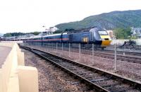 A May evening in 2002 sees the GNER 1200 ex-Kings Cross <I>Highland Chieftain</I> HST pulling away from the Aviemore stop on the last leg of its 581 mile journey to Inverness.<br><br>[John Furnevel 13/05/2002]
