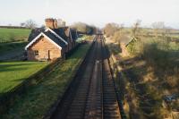 Looking north over the former station at Cumwhinton on 21 January 2017. The rails are rusty at the moment with the closure of the S&C at Eden Brows a short distance to the south.<br><br>[John McIntyre 21/01/2017]