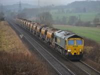 Freightliner 66551 nears Dalgety Bay with a Millerhill - Montrose ballast on 22 January. (The same loco as in John's Millerhill photograph on the same day [see image 57856]).<br><br>[Bill Roberton 22/01/2017]