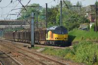 Colas 60026 approaches Leyland on the Up Fast with the Carlisle to Chirk log train on 03 June 2016. This regular service has been rather less frequent in the last few months, reported as being due to work being carried out at the Chirk factory.<br><br>[John McIntyre 03/06/2016]