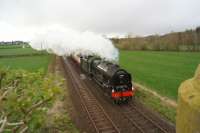 Ex LMS 4-6-0 no.46115 Scots Guardsman approaches Curthwaite between Wigton and Carlisle while working a railtour on 16 April 2016. The former station is behind the photographer.<br><br>[John McIntyre 16/04/2016]
