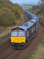 The Inverness - Mossend intermodal, diverted through Fife because of engineering work in the Stirling area, passes the former Lumphinnans Central Junction behind DRS 66423, on 30 October.<br><br>[Bill Roberton 30/10/2016]