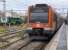 Local EMU on arrival from Barcelona.  Note the low-visibility tamper in the sidings!<br><br>[Bill Roberton 13/10/2016]