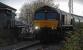 Southbound 66743 passes the signal box at Craigendoran and is about to join the Helensburgh line.<br><br>[Ewan Crawford 18/11/2016]