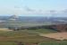 Not a typical railway photo - spot the train. What a view after 132 steps up Garleton Monument near Haddington. North Berwick Law and Bass Rock evident, as well as a toy-town train some couple of miles east of Drem.<br><br>[Bruce McCartney 23/11/2016]