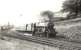 Class 5 4-6-0 44795 passing Corsebar Junction and approaching Paisley West with a Largs - St Enoch train on 2 September 1957. In the background Horwich Mogul 42914 is standing in the loop on the Potterhill Branch. [Ref query 516]  <br><br>[G H Robin collection by courtesy of the Mitchell Library, Glasgow 02/09/1957]