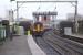 A pair of EMT Class 158s heading west from Deansgate station towards Castlefields Jct with the 1057 service from Norwich to Liverpool on a damp and dull 10 January 2017.<br><br>[John McIntyre 10/01/2017]