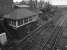 Ashington signal box looking north in 1987. The line to the left ran to Ashington Colliery and the Butterwell Disposal Point. Seldom used, the connection has been severed allowing box closure in 2010. The double track to the right ran to the Lynemouth Aluminium Smelter and Lynemouth Power Station, having started life as the Newbigging Branch.<br><br>[Bill Roberton //1987]