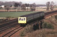 The last train to use the Down (formerly Up) Slow between Swinlees and Dalry was the 1350 Glasgow Central to Ardrossan Harbour on Saturday 27/10/84. It is seen here nearing the station.<br><br>[Donald Hillier 27/10/1984]